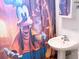 Bathroom with a modern sink and a Goofy themed shower curtain at 3116 Crestwood Dr, Port Charlotte, FL 33952