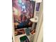Compact bathroom with a pedestal sink and Goofy themed shower curtain and matching bath mat at 3116 Crestwood Dr, Port Charlotte, FL 33952