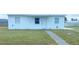 Charming single-story home with a well-maintained lawn and inviting front entrance at 3116 Crestwood Dr, Port Charlotte, FL 33952