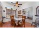 Dining room featuring wood floors, natural light, and an open view to the front entrance at 312 Mendoza St, Punta Gorda, FL 33983