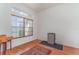 Bright flex room offering a versatile space with natural light, hardwood floors, and a mini-fridge at 312 Mendoza St, Punta Gorda, FL 33983
