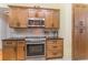 Updated kitchen featuring stainless steel appliances, granite counters, and custom cabinetry at 312 Mendoza St, Punta Gorda, FL 33983