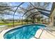 Relaxing pool with a screen enclosure providing a private outdoor retreat at 312 Mendoza St, Punta Gorda, FL 33983