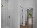 Bathroom showing tile shower, tile floors, and view into the house at 368 Manly St, Port Charlotte, FL 33953