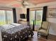 Cozy bedroom with a view of pond, featuring modern decor and a comfortable bed at 4072 Oakview Dr # C5, Punta Gorda, FL 33980