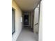 Exterior entryway features a door and window at 4072 Oakview Dr # C5, Punta Gorda, FL 33980