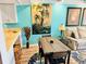 The living area showcases colorful decor and comfortable seating arrangement at 4072 Oakview Dr # C5, Punta Gorda, FL 33980