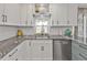 Well-designed kitchen with stainless steel appliances, granite countertops, and ample storage, creating an inviting space at 4091 Rock Creek Dr, Port Charlotte, FL 33948