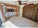 Living room showcases an open floor plan and exposed framework, awaiting new design at 4498 Northshore Dr, Punta Gorda, FL 33980