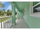 Side porch view showcasing the home's architecture and outdoor living space at 535 Milus St, Punta Gorda, FL 33950