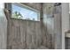 Shower featuring stylish tilework, a window, and sleek fixtures at 535 Milus St, Punta Gorda, FL 33950