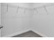 Walk-in closet with installed shelving, ready for organization and storage at 535 Milus St, Punta Gorda, FL 33950
