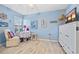Comfortable bedroom with wood flooring and nautical decor, perfect for relaxation at 601 Shreve St # 62A, Punta Gorda, FL 33950