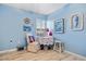 Bright bedroom with light wood floors, nautical decor, and plenty of natural light at 601 Shreve St # 62A, Punta Gorda, FL 33950