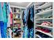 Organized walk-in closet with clothing racks and shoe shelves at 601 Shreve St # 62A, Punta Gorda, FL 33950