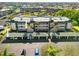Exterior of condo building with covered parking and well-maintained grounds at 601 Shreve St # 62A, Punta Gorda, FL 33950