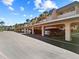 A covered parking area with multiple parking spaces available for residents and guests at Banyan Point at 601 Shreve St # 62A, Punta Gorda, FL 33950