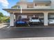 Covered parking area featuring assigned spaces for residents and guests at 601 Shreve St # 62A, Punta Gorda, FL 33950