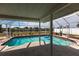 Relax in this screened in pool with a beautiful view of the canal and backyard at 806 W Ellicott Cir, Port Charlotte, FL 33952