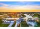 Aerial view of waterfront home showcasing its location on the canal at 9493 St Paul Dr, Port Charlotte, FL 33981