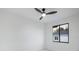 This bedroom has bright natural light, fresh paint, modern ceiling fan and a pleasant view at 9493 St Paul Dr, Port Charlotte, FL 33981