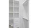 Organized walk-in closet with adjustable shelving and ample storage space at 9493 St Paul Dr, Port Charlotte, FL 33981