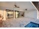 Outdoor patio features ceiling fans, tiled floor, and glass doors to the living areas at 9493 St Paul Dr, Port Charlotte, FL 33981