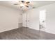 Bright bedroom with ceiling fan, new floors and access to ensuite bathroom at 1214 Ramsdel St, Port Charlotte, FL 33952