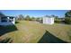 The backyard has a shed with canal views at 13632 Clara Ln, Port Charlotte, FL 33981