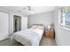 Bedroom featuring a ceiling fan, neutral walls, and tiled floor at 13632 Clara Ln, Port Charlotte, FL 33981