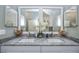 Bathroom double vanity with marble countertop and decorative mirrors at 1420 Winding Oak Dr, Port Charlotte, FL 33948