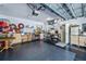 Spacious garage featuring ample storage, work area, and durable flooring at 1420 Winding Oak Dr, Port Charlotte, FL 33948