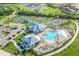 Aerial view of a community featuring a pool, tennis courts and clubhouse at 14234 Heritage Landing Blvd # 1016, Punta Gorda, FL 33955