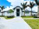 Well-maintained building exterior surrounded by lush landscaping and clear blue skies at 14234 Heritage Landing Blvd # 1016, Punta Gorda, FL 33955