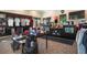 Well-stocked pro shop interior displaying golf apparel, equipment, and accessories with a service counter at 14234 Heritage Landing Blvd # 1016, Punta Gorda, FL 33955