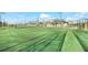 Exterior tennis court with lush green surroundings for outdoor activities at 14234 Heritage Landing Blvd # 1016, Punta Gorda, FL 33955