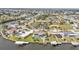Panoramic aerial view highlights the waterfront community, offering access to canals and picturesque water views at 155 Francis Ne Dr, Port Charlotte, FL 33952