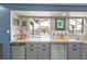 Kitchen with modern stainless appliances, ample counter space, and bright light at 155 Francis Ne Dr, Port Charlotte, FL 33952