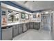 Well-appointed kitchen with stainless steel appliances and a view to the water at 155 Francis Ne Dr, Port Charlotte, FL 33952