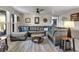 Inviting living room boasts a spacious gray sectional and cozy decor at 155 Francis Ne Dr, Port Charlotte, FL 33952