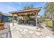 Entertaining outdoor bar featuring seating and grill, perfect for hosting summer barbecues and social gatherings at 155 Francis Ne Dr, Port Charlotte, FL 33952