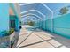 Beautiful pool area with screened enclosure, pool, and spa at 1563 Arundel Ave, North Port, FL 34288