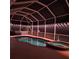Tranquil screened-in pool and spa area illuminated with soft lighting, perfect for relaxation at 1563 Arundel Ave, North Port, FL 34288