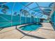 Enclosed pool and hot tub for year-round enjoyment in a private and comfortable setting at 1563 Arundel Ave, North Port, FL 34288