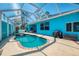 Inviting pool and patio area ideal for outdoor living and recreation at 1563 Arundel Ave, North Port, FL 34288