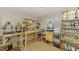 Room featuring a workbench, 3D printers, storage, and a window at 1563 Arundel Ave, North Port, FL 34288