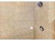 Close-up of bathroom shower with neutral tile, shower head, and soap dish at 1563 Arundel Ave, North Port, FL 34288