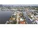 Expansive aerial view of a neighborhood on the water, showcasing numerous canals and waterfront properties at 168 Morgan Se Ln, Port Charlotte, FL 33952