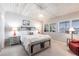 Bright bedroom with water views, ceiling detail, and neutral tones at 168 Morgan Se Ln, Port Charlotte, FL 33952