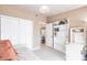 Cozy bedroom with a daybed and a view into the kitchen area at 168 Morgan Se Ln, Port Charlotte, FL 33952